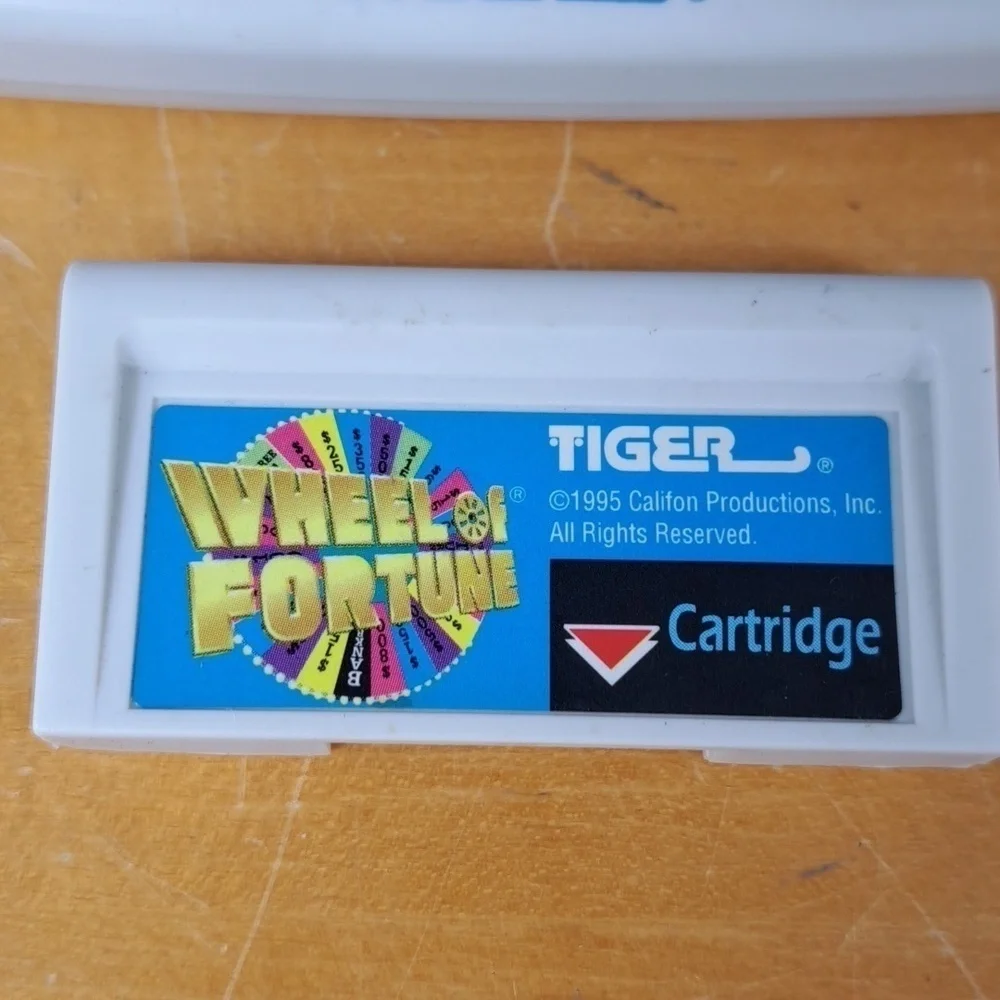 Vintage 1999 Tiger Wheel of Fortune hand held electronic game show game Tested